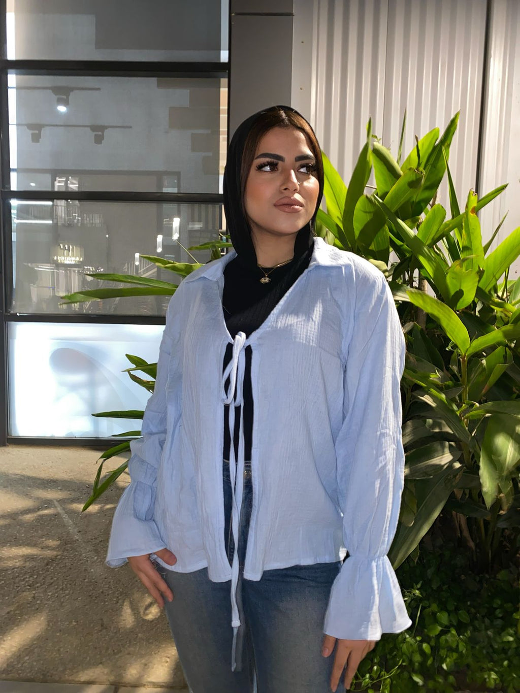 Knit blouse with a bow